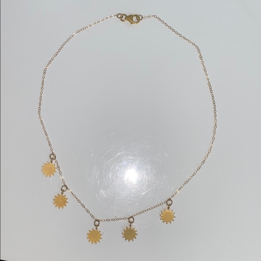 Gold sun necklace